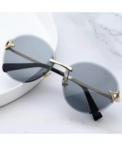 Classic fashion frameless sunshade- round- PC lens ladies sunglasses - E - CT18S02UU43 $68.32 Round